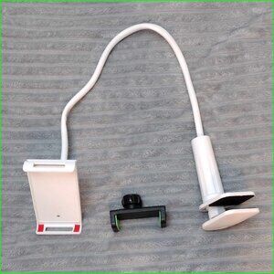 Very stiff clamp style device holder with interchangeable brackets